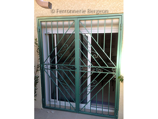 Image: porte securité verte ferronnerie bergeon perpignan